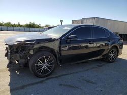 Salvage cars for sale at Fresno, CA auction: 2021 Toyota Camry SE