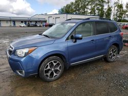 Salvage cars for sale from Copart Arlington, WA: 2015 Subaru Forester 2.0XT Touring