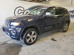Salvage SUVs for sale at auction: 2015 Jeep Grand Cherokee Overland