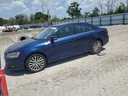 Salvage cars for sale from Copart Riverview, FL: 2011 Volkswagen Jetta SEL