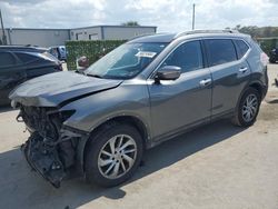 Salvage cars for sale from Copart Orlando, FL: 2015 Nissan Rogue S