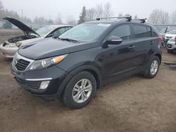 Salvage cars for sale from Copart Bowmanville, ON: 2011 KIA Sportage LX