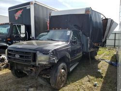 Salvage trucks for sale at Elgin, IL auction: 2000 Ford F450 Super Duty