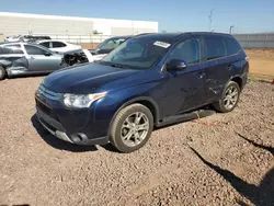 Salvage cars for sale at Phoenix, AZ auction: 2015 Mitsubishi Outlander SE