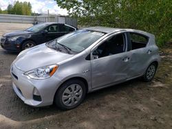 Salvage cars for sale from Copart Arlington, WA: 2012 Toyota Prius C