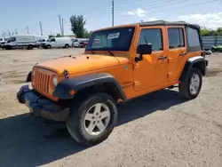 Salvage cars for sale at Miami, FL auction: 2012 Jeep Wrangler Unlimited Sport