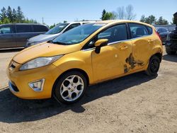 Salvage cars for sale at auction: 2011 Ford Fiesta SES