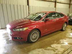 Salvage cars for sale at West Mifflin, PA auction: 2014 Ford Fusion Titanium HEV