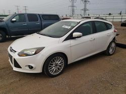 Salvage cars for sale at Elgin, IL auction: 2014 Ford Focus Titanium