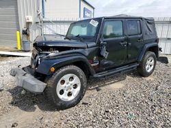 Salvage cars for sale from Copart Memphis, TN: 2013 Jeep Wrangler Unlimited Sahara