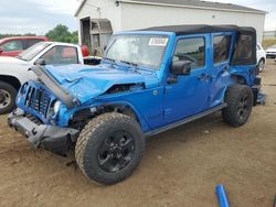 Salvage cars for sale from Copart Portland, MI: 2015 Jeep Wrangler Unlimited Sahara