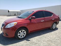 Salvage cars for sale from Copart Adelanto, CA: 2013 Nissan Versa S