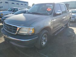 Salvage Trucks for parts for sale at auction: 2002 Ford F150 Supercrew
