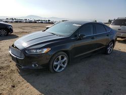 Salvage cars for sale from Copart Bakersfield, CA: 2014 Ford Fusion SE