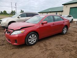 Salvage cars for sale at Kincheloe, MI auction: 2011 Toyota Camry Hybrid