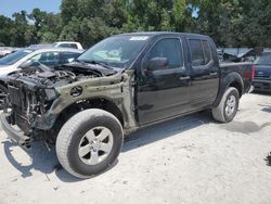 Salvage cars for sale from Copart Ocala, FL: 2010 Nissan Frontier Crew Cab SE