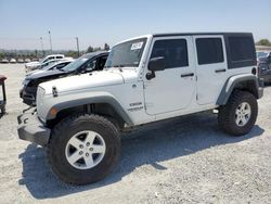 Jeep salvage cars for sale: 2014 Jeep Wrangler Unlimited Sport