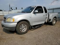 Salvage cars for sale from Copart Mercedes, TX: 2002 Ford F150
