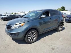 Salvage cars for sale from Copart Bakersfield, CA: 2014 KIA Sportage Base