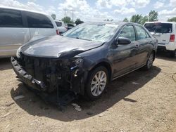 Salvage cars for sale at auction: 2012 Toyota Camry Hybrid