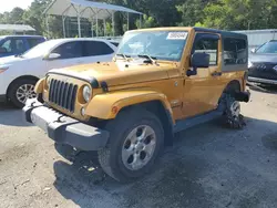 Jeep Wrangler Sahara salvage cars for sale: 2014 Jeep Wrangler Sahara