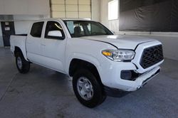 Salvage cars for sale at Farr West, UT auction: 2020 Toyota Tacoma Double Cab