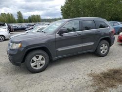 Vehiculos salvage en venta de Copart Arlington, WA: 2011 Jeep Grand Cherokee Laredo