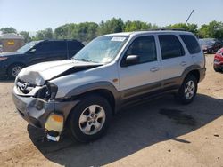 Mazda salvage cars for sale: 2004 Mazda Tribute LX