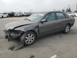 Salvage cars for sale from Copart Rancho Cucamonga, CA: 2003 Toyota Avalon XL