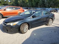 Salvage cars for sale from Copart Ocala, FL: 2015 Toyota Camry LE