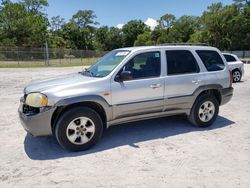 Salvage cars for sale from Copart Fort Pierce, FL: 2003 Mazda Tribute LX