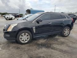 Salvage cars for sale at Miami, FL auction: 2015 Cadillac SRX Luxury Collection