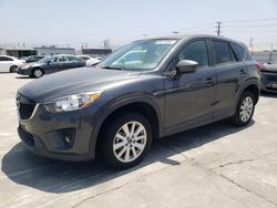 Salvage cars for sale from Copart Sun Valley, CA: 2014 Mazda CX-5 Touring