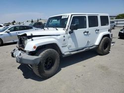 Jeep Wrangler Unlimited Sahara salvage cars for sale: 2012 Jeep Wrangler Unlimited Sahara