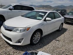 2014 Toyota Camry Hybrid en venta en Magna, UT