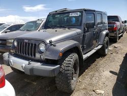 Salvage cars for sale from Copart Brighton, CO: 2014 Jeep Wrangler Unlimited Sahara