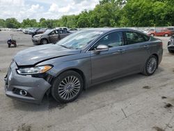 Salvage cars for sale at Ellwood City, PA auction: 2013 Ford Fusion Titanium
