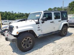 Salvage cars for sale from Copart Ellenwood, GA: 2013 Jeep Wrangler Unlimited Sport