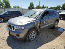 Salvage cars for sale at Lansing, MI auction: 2012 Jeep Grand Cherokee Laredo