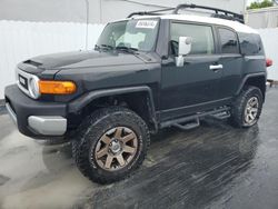 Salvage cars for sale at Opa Locka, FL auction: 2014 Toyota FJ Cruiser