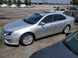 Salvage cars for sale from Copart Rancho Cucamonga, CA: 2011 Ford Fusion Hybrid