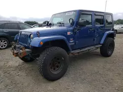 Salvage cars for sale from Copart East Granby, CT: 2010 Jeep Wrangler Unlimited Sahara
