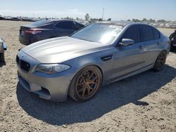 Flood-damaged cars for sale at auction: 2013 BMW M5