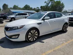 Salvage cars for sale at auction: 2011 KIA Optima SX