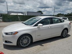 Salvage cars for sale at Orlando, FL auction: 2013 Ford Fusion SE Hybrid