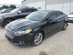 Salvage cars for sale at Apopka, FL auction: 2016 Ford Fusion Titanium HEV