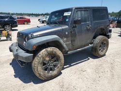 Carros dañados por inundaciones a la venta en subasta: 2014 Jeep Wrangler Sport