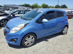 Salvage cars for sale at Sacramento, CA auction: 2014 Chevrolet Spark 1LT