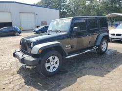 Salvage cars for sale at Austell, GA auction: 2009 Jeep Wrangler Unlimited X