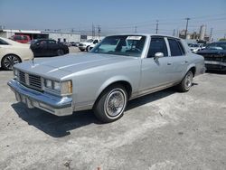 Salvage cars for sale at Sun Valley, CA auction: 1987 Oldsmobile Cutlass Supreme Brougham